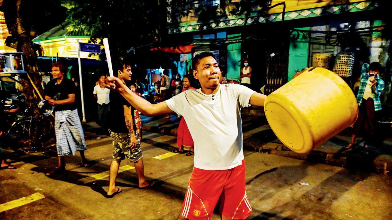 Thousands protest in Myanmar, police use water cannons