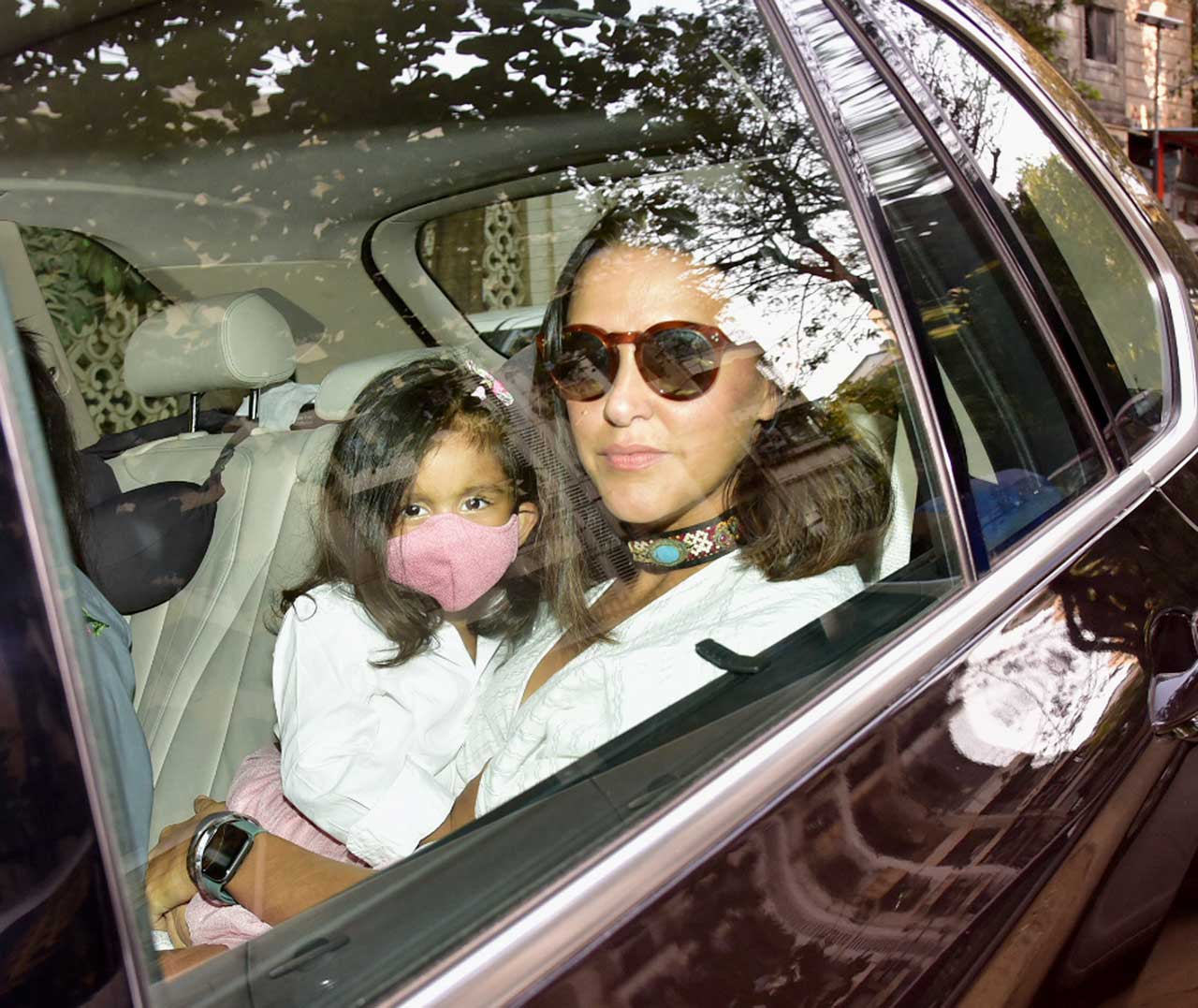 Neha Dhupia and Mehr Dhupia Bedi posed for the shutterbugs as they attended Yash and Roohi's party. 