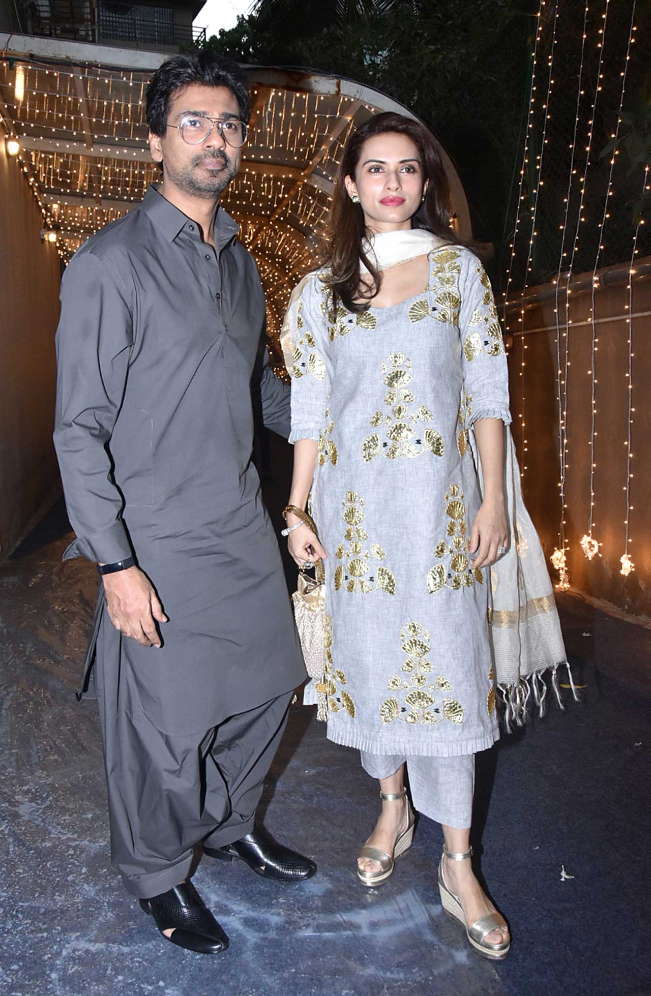 Nikhil Dwivedi and Gowri Pandit posed for the shutterbugs as they arrived at Priyaank K Sharma and Shaza Morani's wedding. Nikhil opted for a grey coloured pathani, whereas Gowri showed up in a pastel blue ethnic wear.