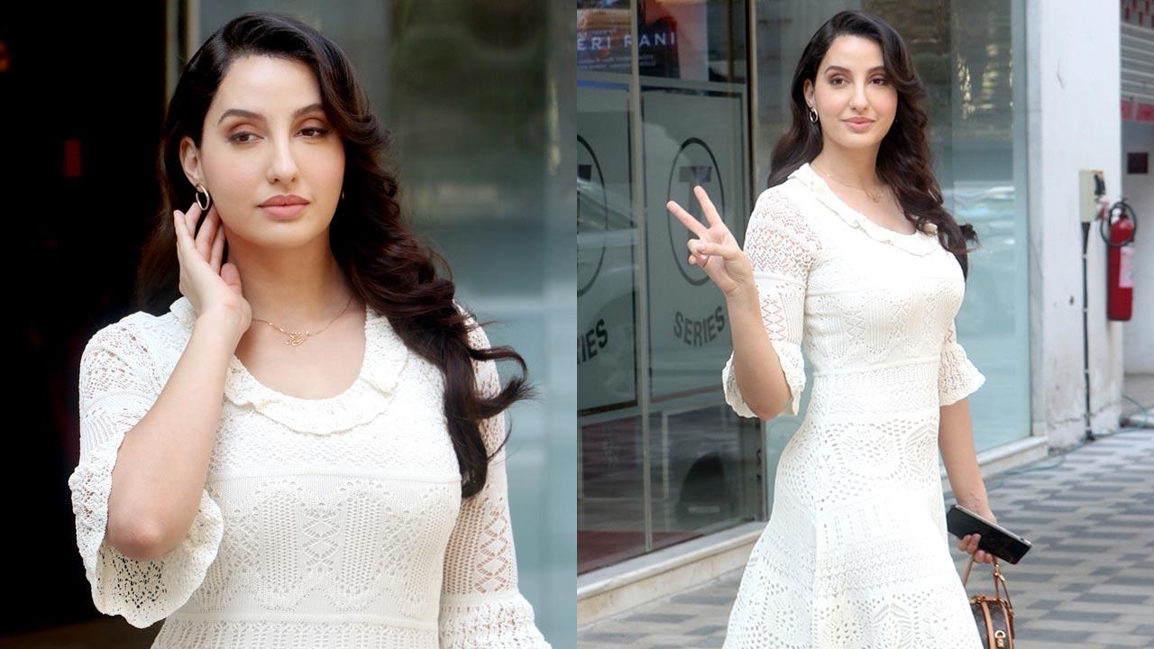 Nora Fatehi stuns in a white crochet dress as she steps out in Mumbai