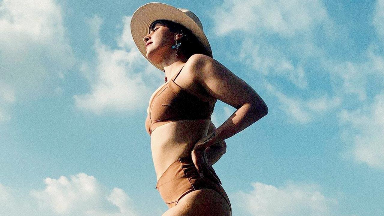 See Photo: Sanya Malhotra looks electrifying in her chocolate brown bikini as she relaxes on the beach