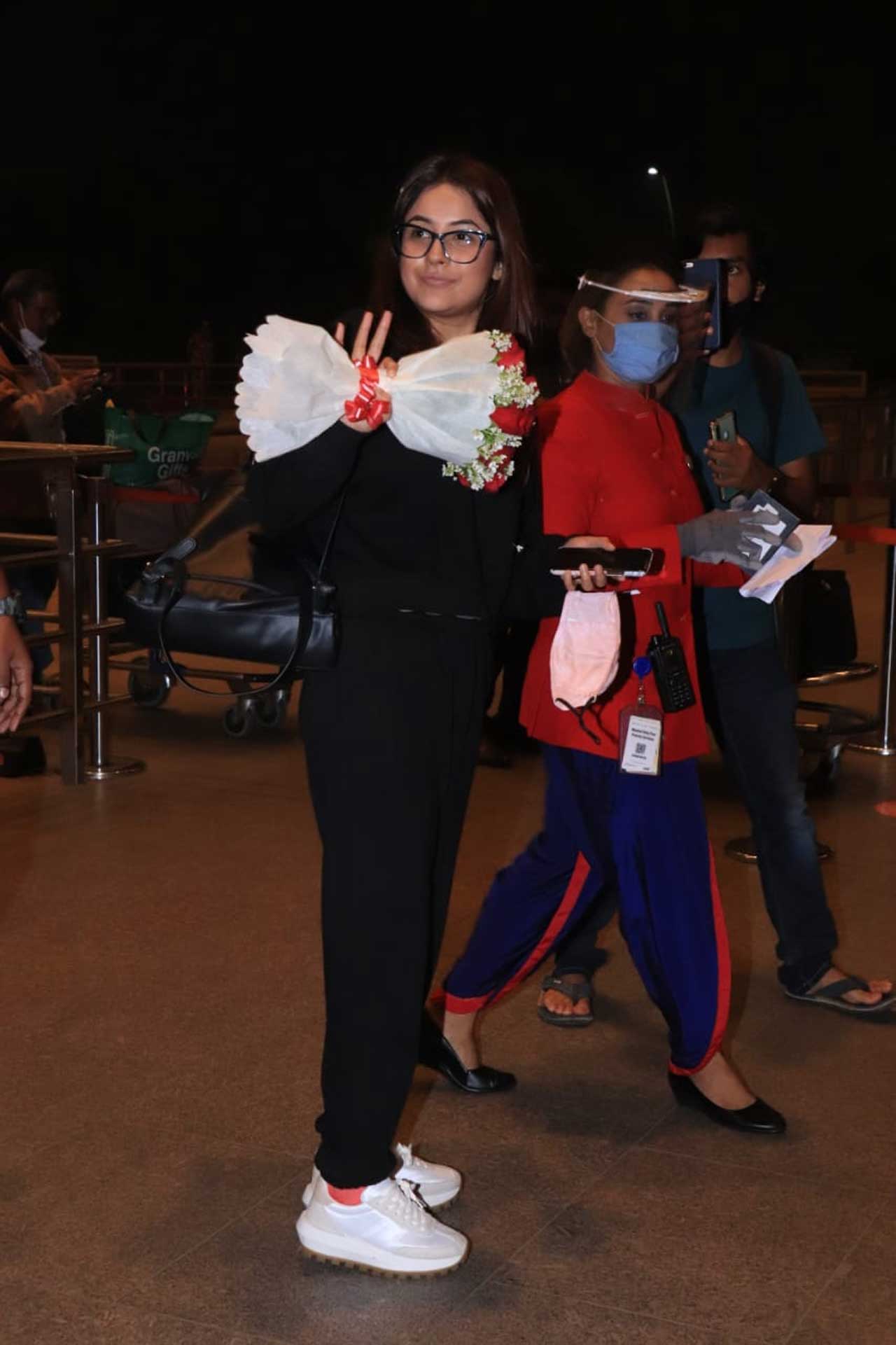 Ex-Bigg Boss contestant Shehnaaz Gill was seen holding a bouquet of flowers at the Mumbai airport.