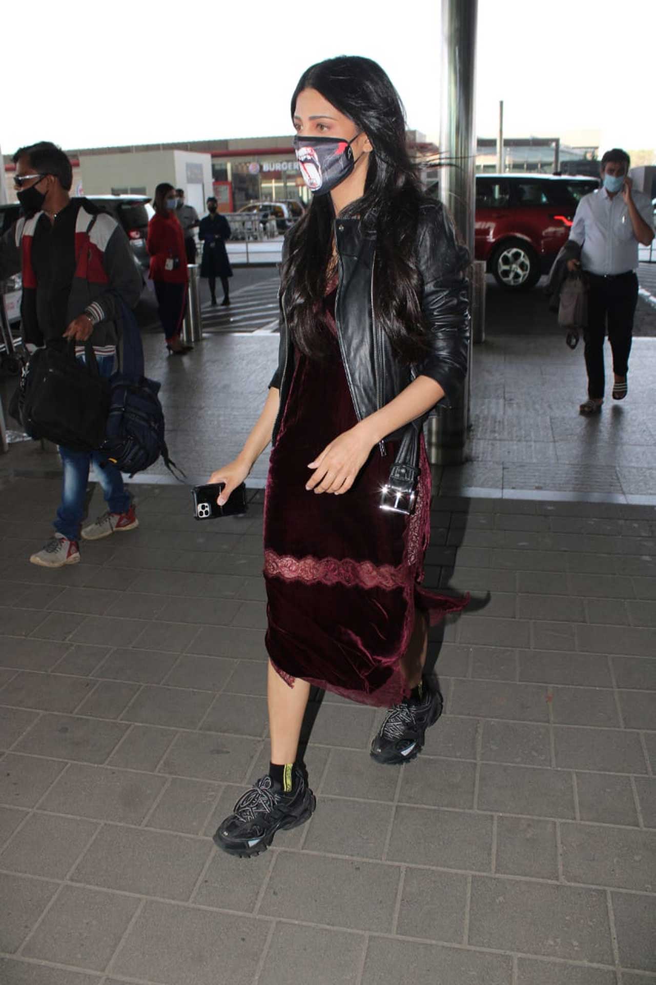 Shruti Haasan stunned in a thigh-high slit velvet dress, which she paired with a black leather jacket. The actress sported black shoes to complete the funky airport look! On the work front, Shruti will soon be seen in Netflix's first Telugu original, Pitta Kathalu. She also revealed that she is busy more with OTT content lately.