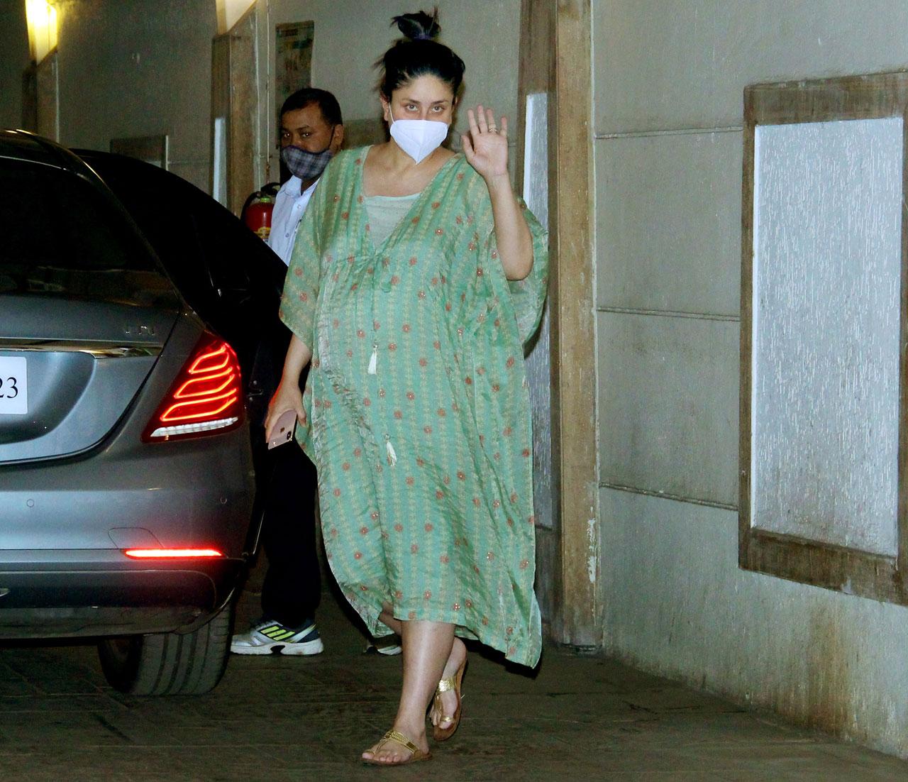 Mom-to-be Kareena Kapoor Khan dressed in a flowing flower dress as clicked at her residence in Bandra. 