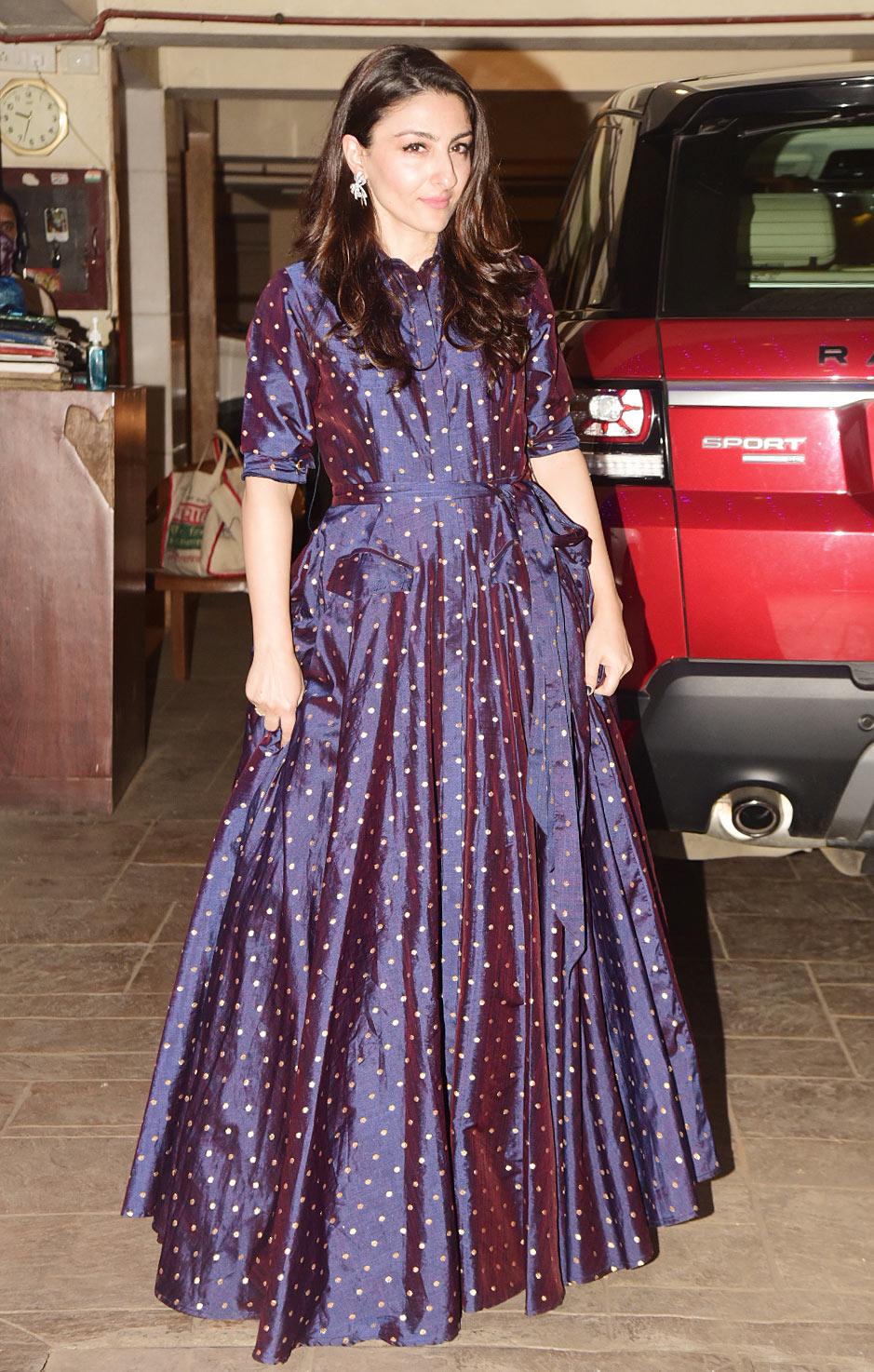 Soha Ali Khan looked pretty in her navy blue polka dot gown as she arrived at brother saif Ali Khan's residence in Bandra. Soha shared multiple posts from the party on her Instagram page. She shared a video of the spread with all the guests ready to tuck in. Soha also shared an adorable photo of her with hubby Kunal and captioned it: Tipping my hat to 2021! Adieu 2020 #happynewyear @khemster2 @shikhatalsania [sic]