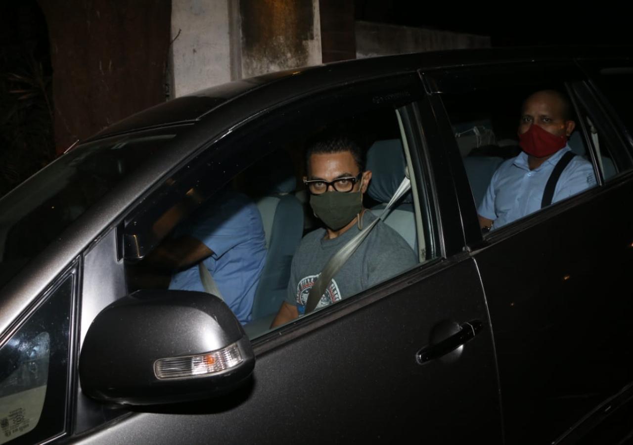 Aamir Khan was snapped in Bandra along with his daughter Ira Khan. The actor opted for a grey t-shirt and pants, while Ira donned a black crop top and jacket and pants. (All pictures: Yogen Shah).