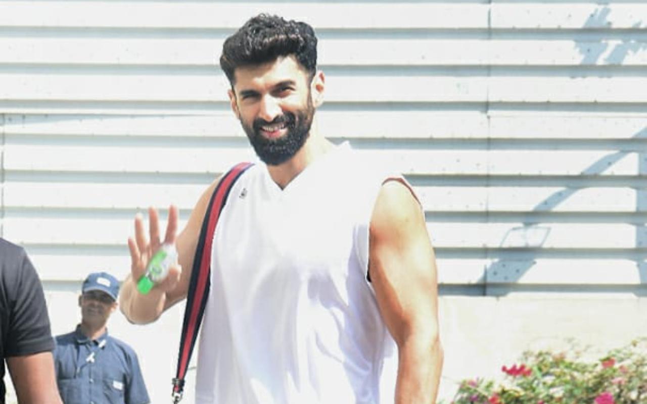 Aditya Roy Kapoor showed off his muscles in his white t-shirt and shorts as she was clicked outside his gym.