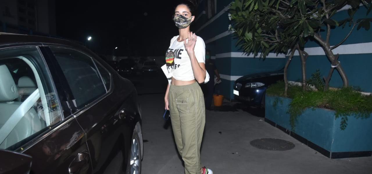 Ananya Panday was clicked by the photographers in Juhu. The actress opted for white crop top and grey pants.