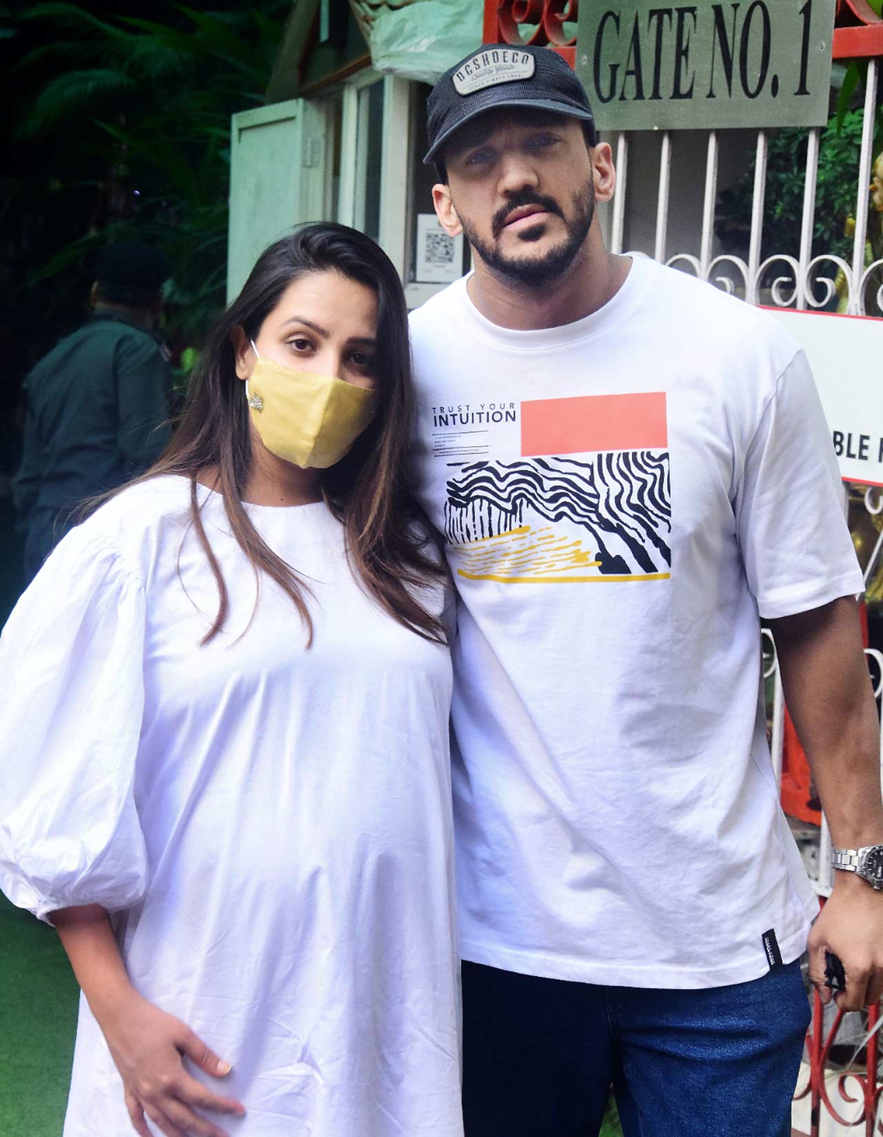 Anita Hassanandani was snapped with Rohit Reddy at a clinic in the city. The actress sported a pretty white outfit during the outing. Speaking of her hubby Rohit, the entrepreneur looked dapper in his casuals. All pictures/Yogen Shah