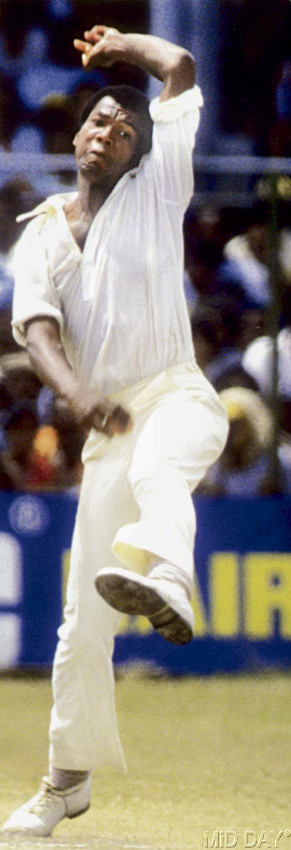 Colin Croft: One of the most deceiving run ups in cricket came from the West Indies pace bowler, Croft. He would run up to a wide angle at the crease and then release the ball inward bang onto the stumps or more so, into the batsman. He was known to be quite the aggressive pacer who inflicted pain on his opponents. (Pic/ Midday archives)