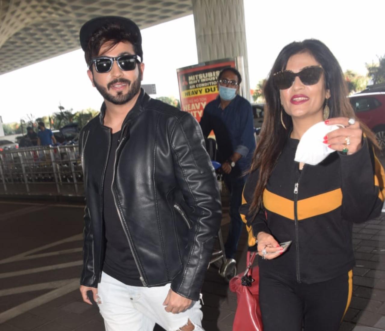 Shivani Kashyap and Dheeraj Dhoopar were also snapped at the airport. The duo twinned in their black outfits. Shivani Kashyap and Dheeraj Dhoopar were also snapped at the airport. The duo twinned in their black outfits.