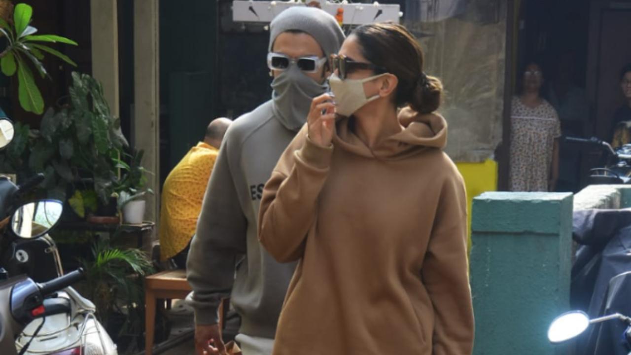 For the outing, Deepika Padukone opted for a brown hoodie and matching trousers. She completed her outfit with a pair of white sports shoes and black glares along with a handbag. On the other hand, Ranveer wore a grey hoodie and trousers along with black sunglasses.