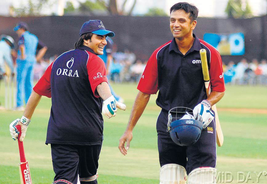 In picture: Rahul Dravid with Bollywood actor/director Arbaaz Khan at Mumbai Police Gymkhana during a benefit game played between film stars and cricketers.