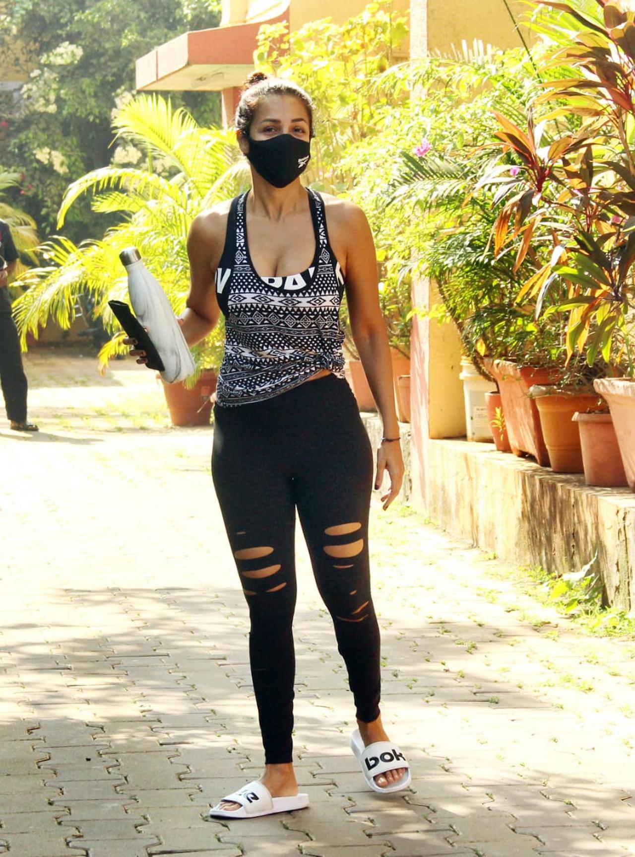 Malaika Arora seemed to be in a great mood while heading to the gym. She was all smiles for the paparazzi, and posed for some candid pictures. 