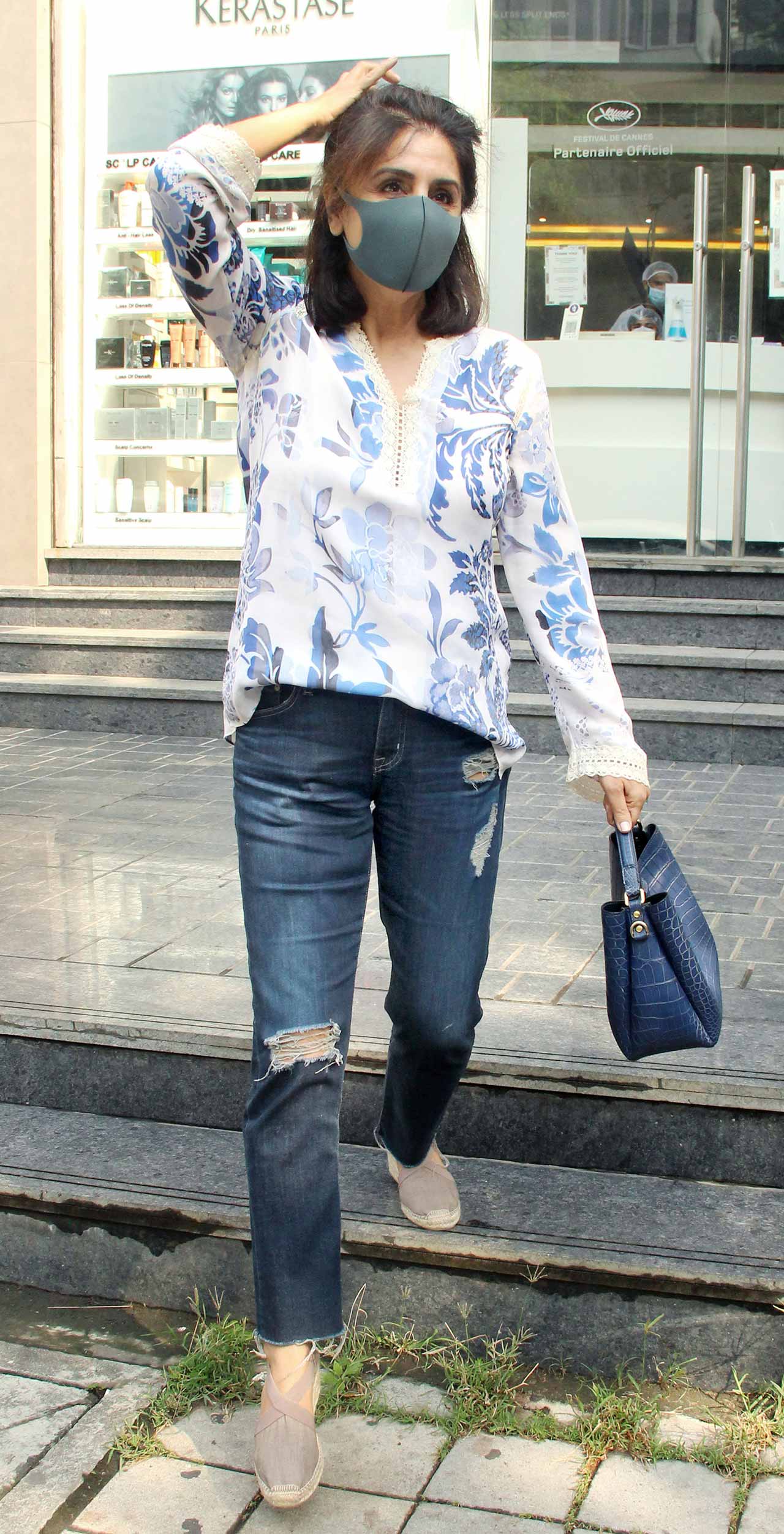 Neetu Kapoor was also spotted strolling the streets of the city. The actress was snapped wearing a casual top, paired with distress denim during the outing.
