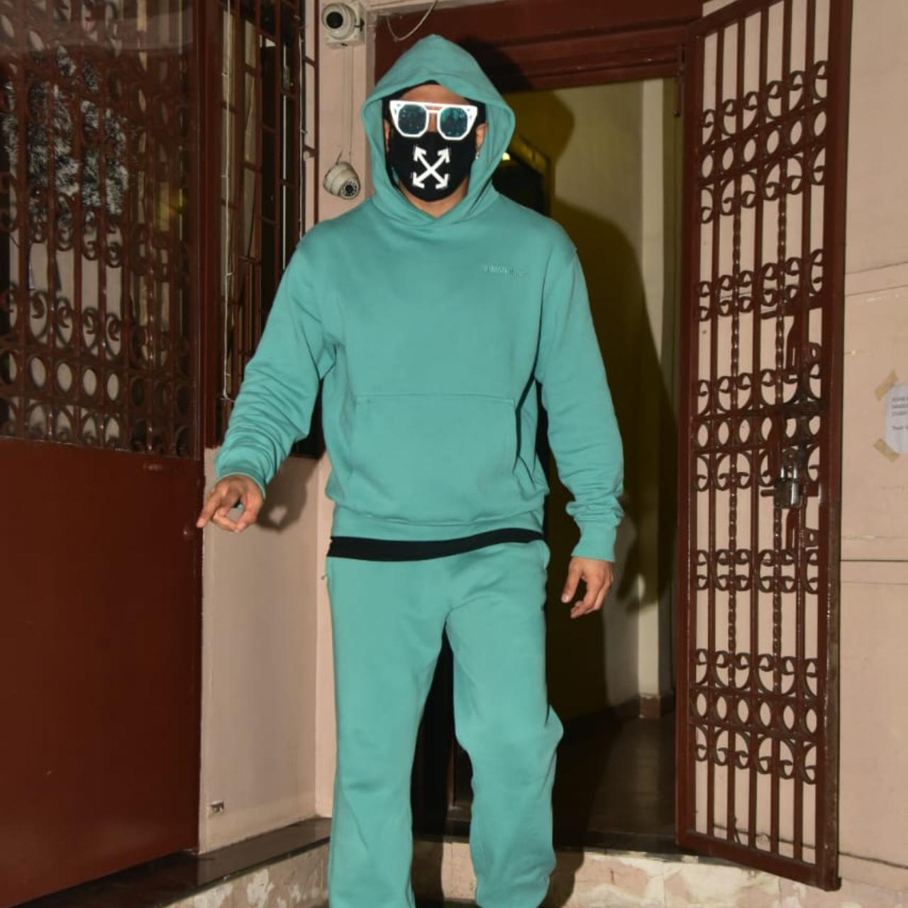 Ranveer Singh was snapped by the paparazzi outside a popular dubbing studio in Bandra. The actor wore a green hoodie and trousers along with green shades. He wore a black designer mask to prevent the spread of COVID-19.