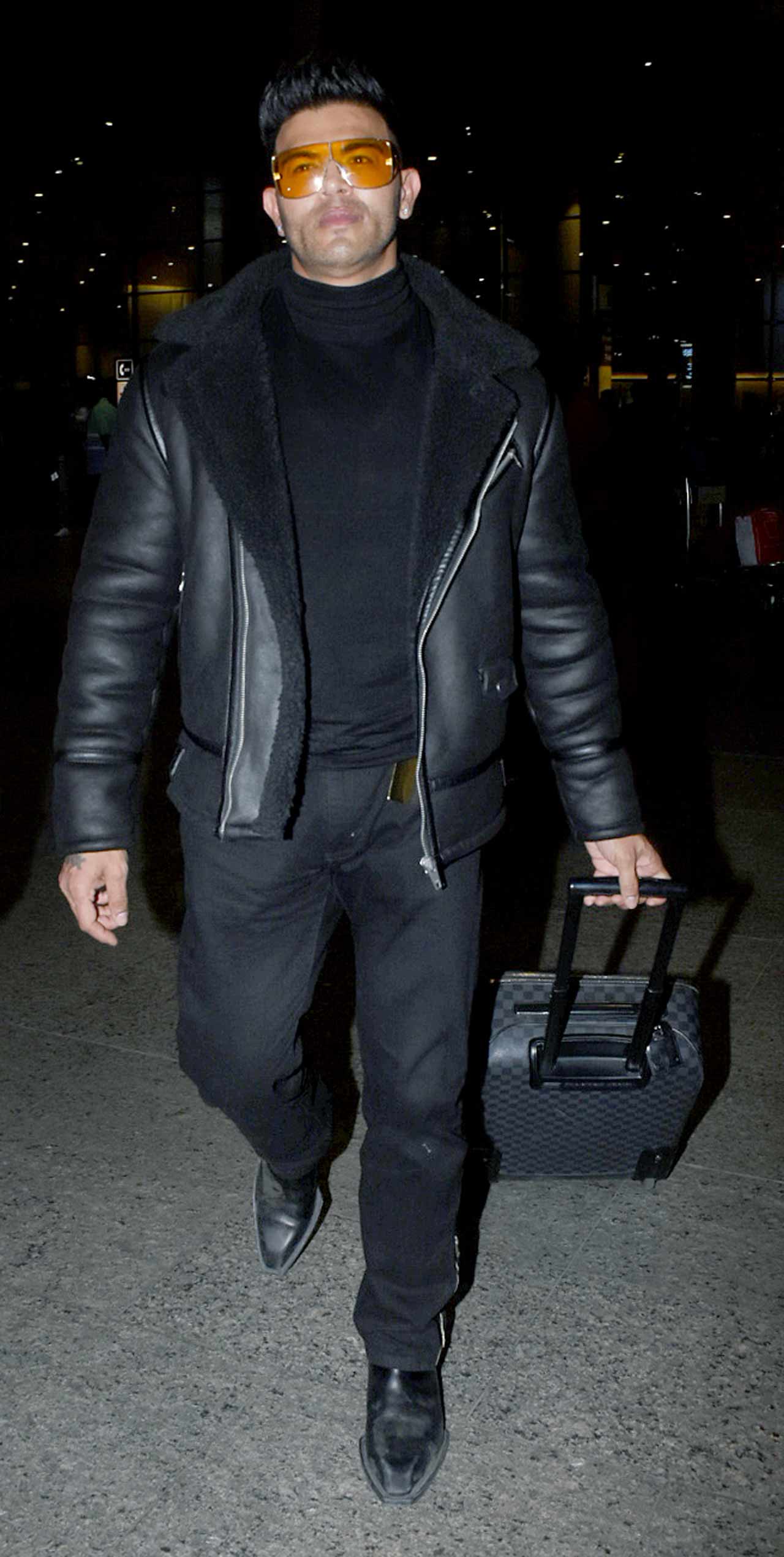 Sahil Khan looked dapper in his all-black outfit when snapped by the paparazzi at the Mumbai airport.