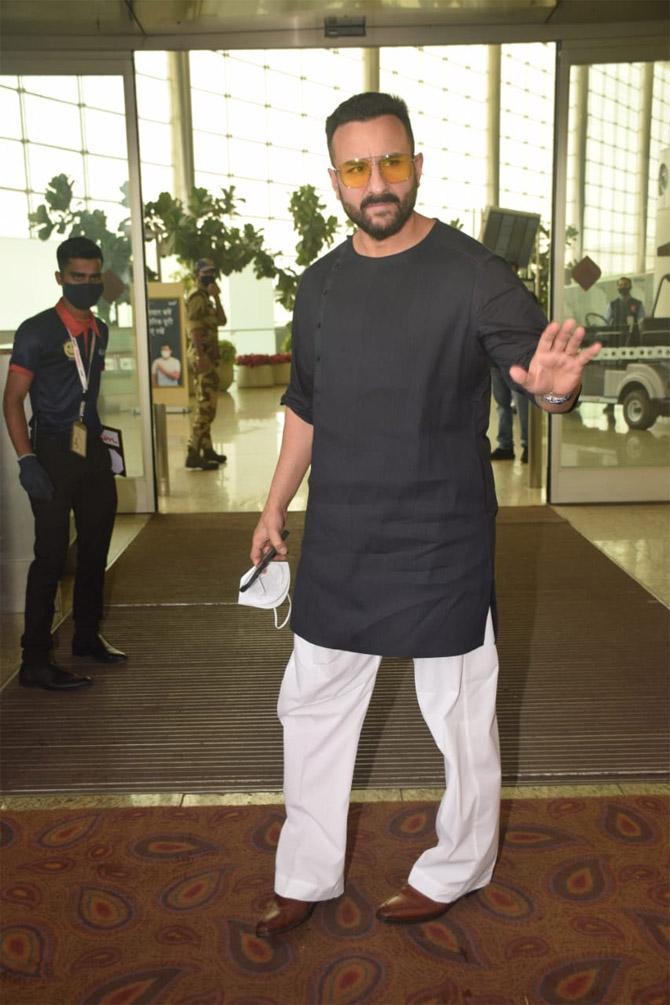 Saif Ali Khan is one of the most stylish actors in Bollywood. And the actor's recent airport looked proved the same. Saif opted for a black kurta and white pyjama, paired with brown leather shoes and yellow shades as his airport look.