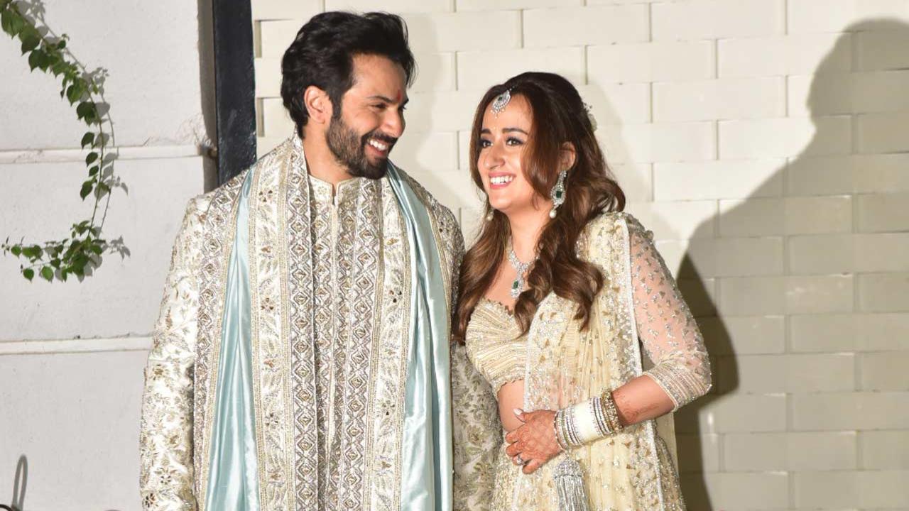 Photo: Varun Dhawan kisses his bride Natasha Dalal at their mehendi ceremony