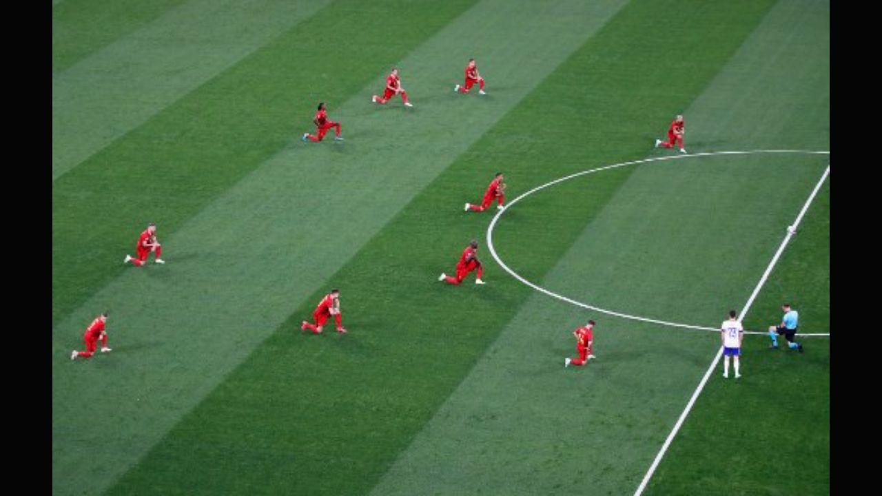The English football players have been actively showing their intolerance towards racism faced by members of their team by taking the knee at all their matches in the last one year at the national and club level. In the Euro 2020, they were accompanied by the Welsh, Belgian, Portuguese, and Italian teams. In this photo, Belgium's players take a knee before the start of the UEFA Euro 2020 Group B football match between Belgium and Russia at the Saint Petersburg Stadium in Saint Petersburg on June 12, 2021. Photo: AFP 
