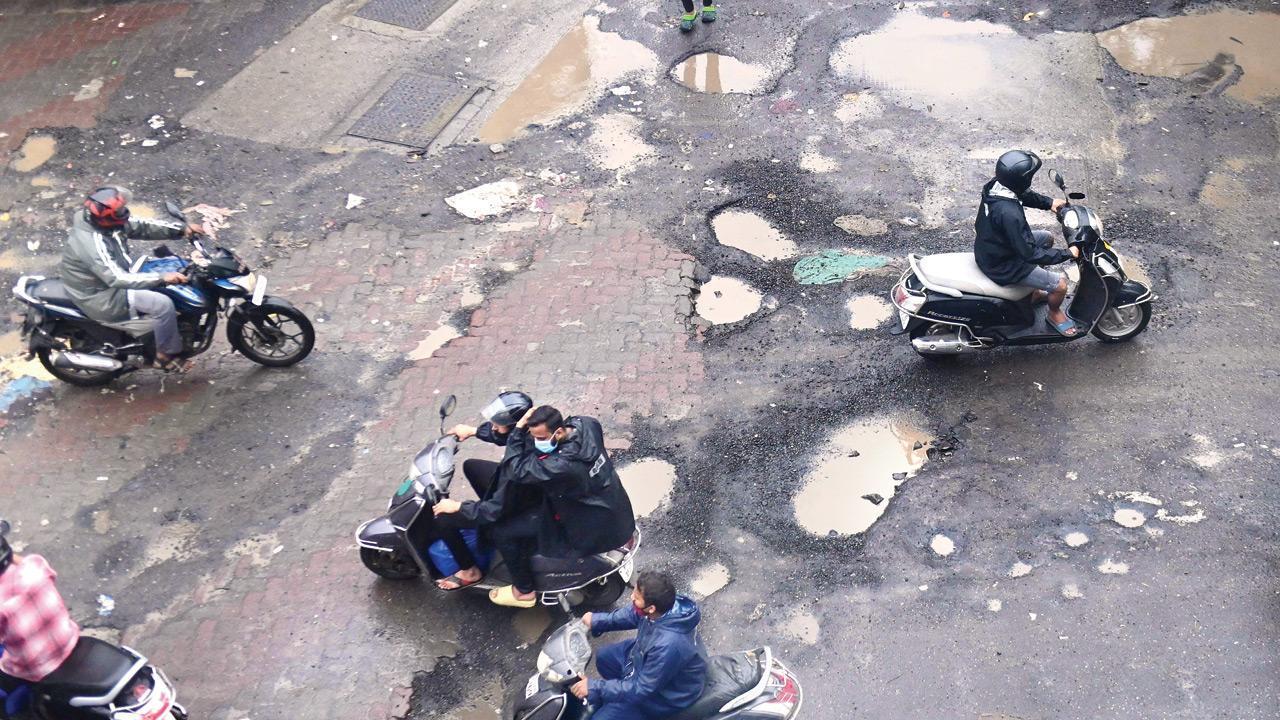 How about linking corporators’ work with potholes?
