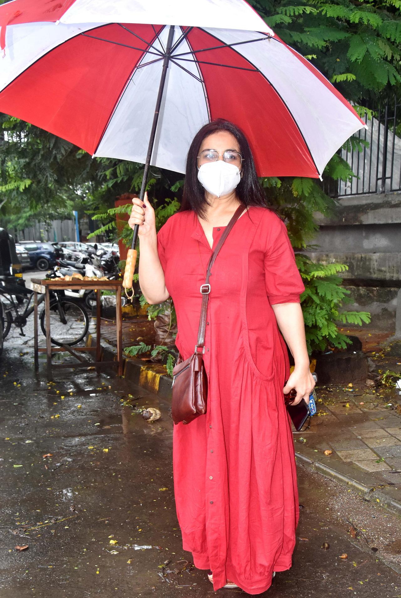 Divya Dutta too was spotted at the same salon in Juhu. The actress sported a red long dress as she arrived at the salon.