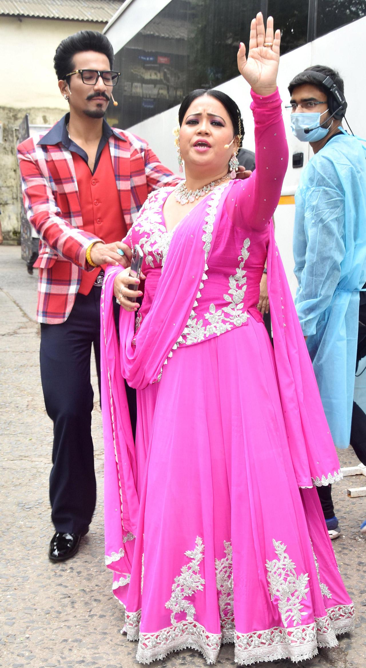 Bharti Singh and Haarsh Limbachiyaa happily posed for the photographers as they were spotted on the sets of India's Best Dancer at Filmistan Studios in Goregaon.