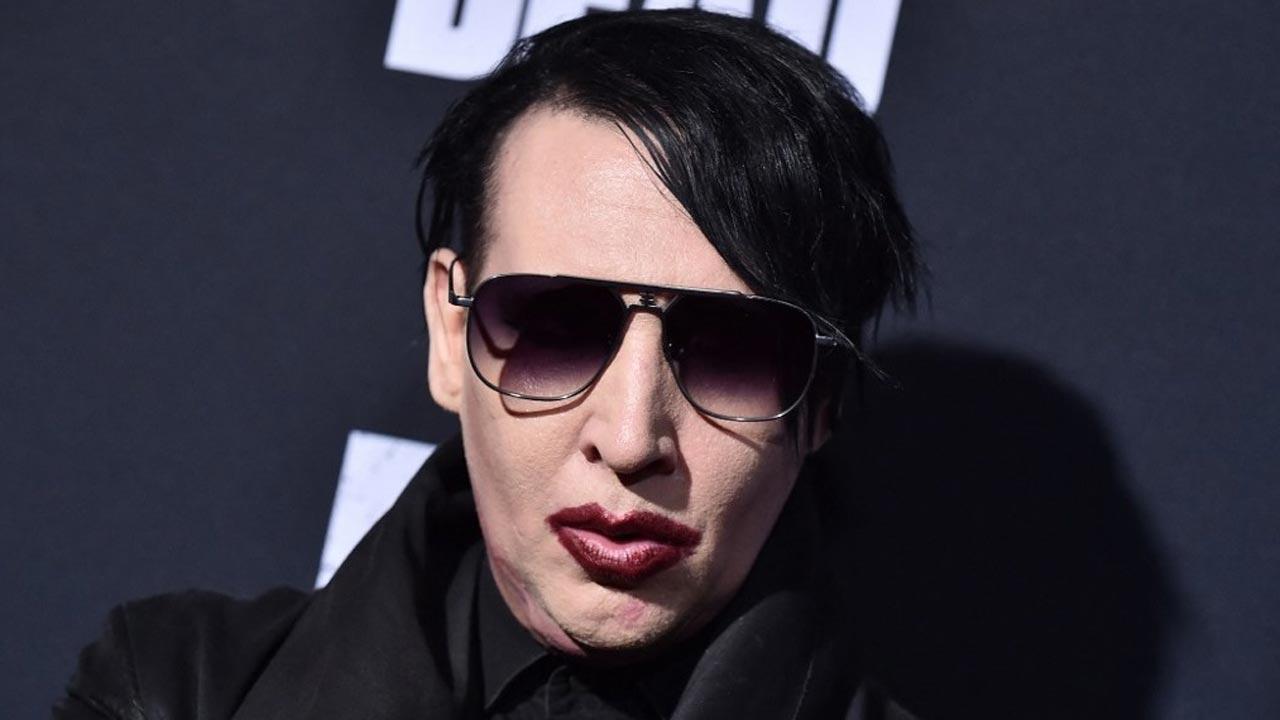 Marilyn Manson released on bail after turning himself in on assault charges
