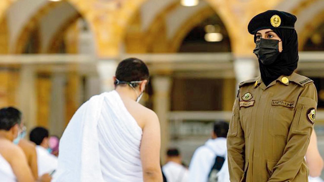 In a first, women stand guard in Mecca