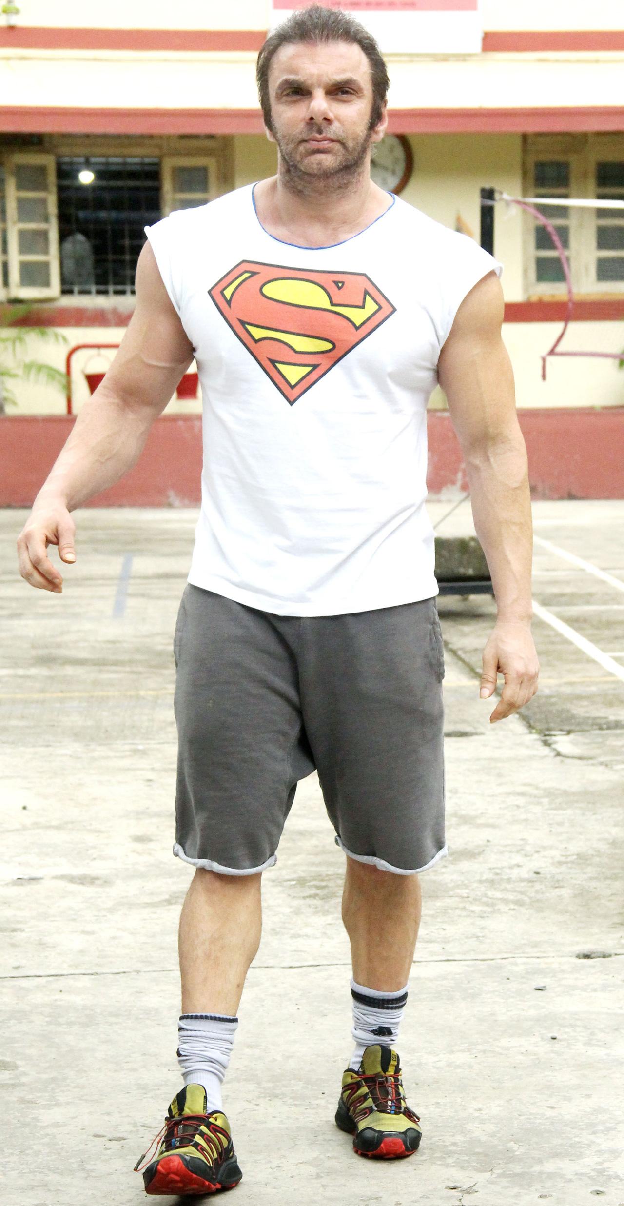 Sohail Khan was clicked at his gym. The actor's attire reminds us of Hulk aka Bruce Banner, who after shrinking back to human form, probably didn't find anything to wear except this Superman t-shirt. And doesn't the beard give the actor a tinge of Wolverine too?