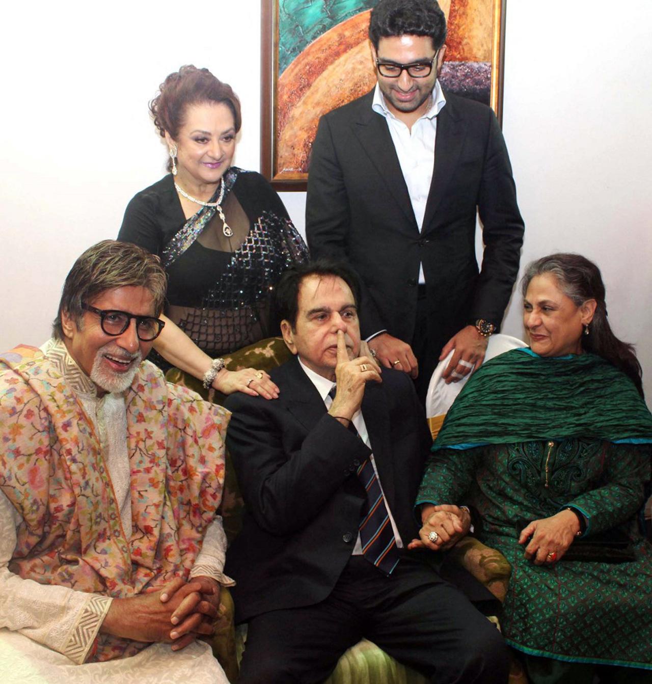 A candid picture of the Bachchans - Amitabh Bachchan, Jaya Bachchan and Abhishek Bachchan, when they attended Dilip Kumar's 89th birthday celebrations