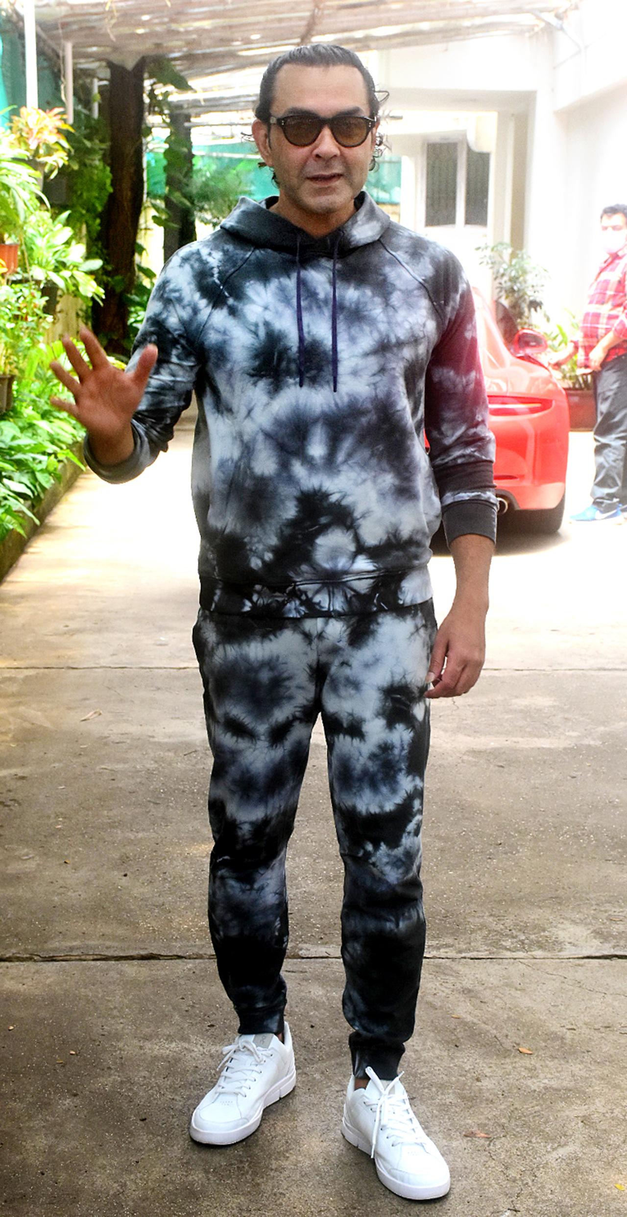 Bobby Deol was spotted outside a popular recording studio in Juhu, Mumbai. The actor was seen in a camo-print co-ord set and white shoes. Bobby, who is back in the spotlight with his role on Prakash Jha's web series 'Aashram', will be seen in 'Love Hostel', 'Apne 2' and 'Animal'.