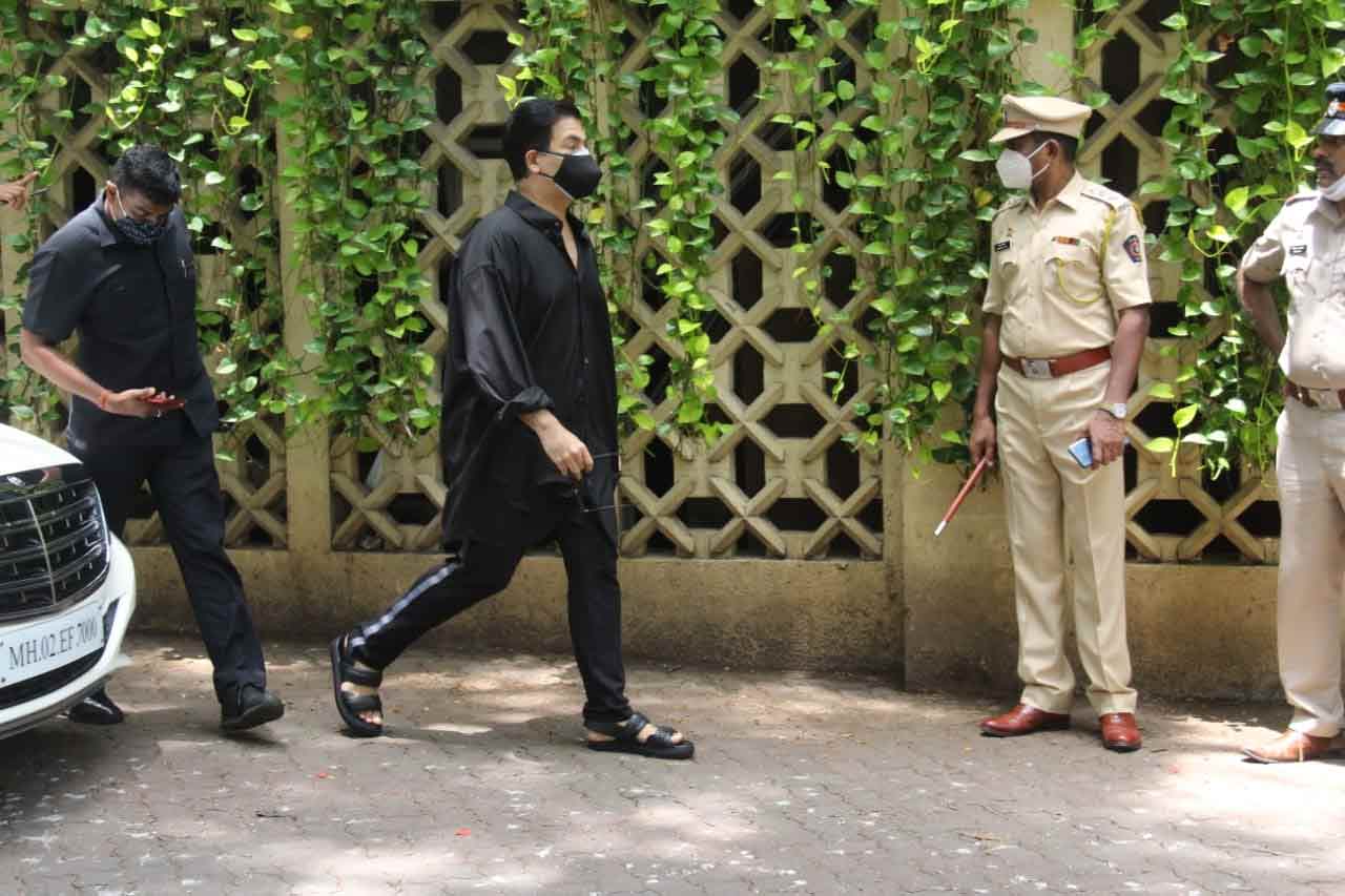 Around 9.30 a.m., an ambulance carrying Dilip Kumar's mortal remains left for his home in Bandra west, with his wife of Saira Banu Khan accompanying along with some family members. In picture: Filmmaker Karan Johar also came in to offer condolence to Dilip Kumar's family.