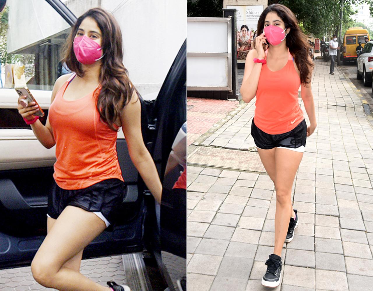 Janhvi Kapoor was spotted outside a clinic in Bandra, Mumbai. Clad in an orange vest top and black athleisure shorts, it seemed like the actress headed to the clinic before hitting the gym.