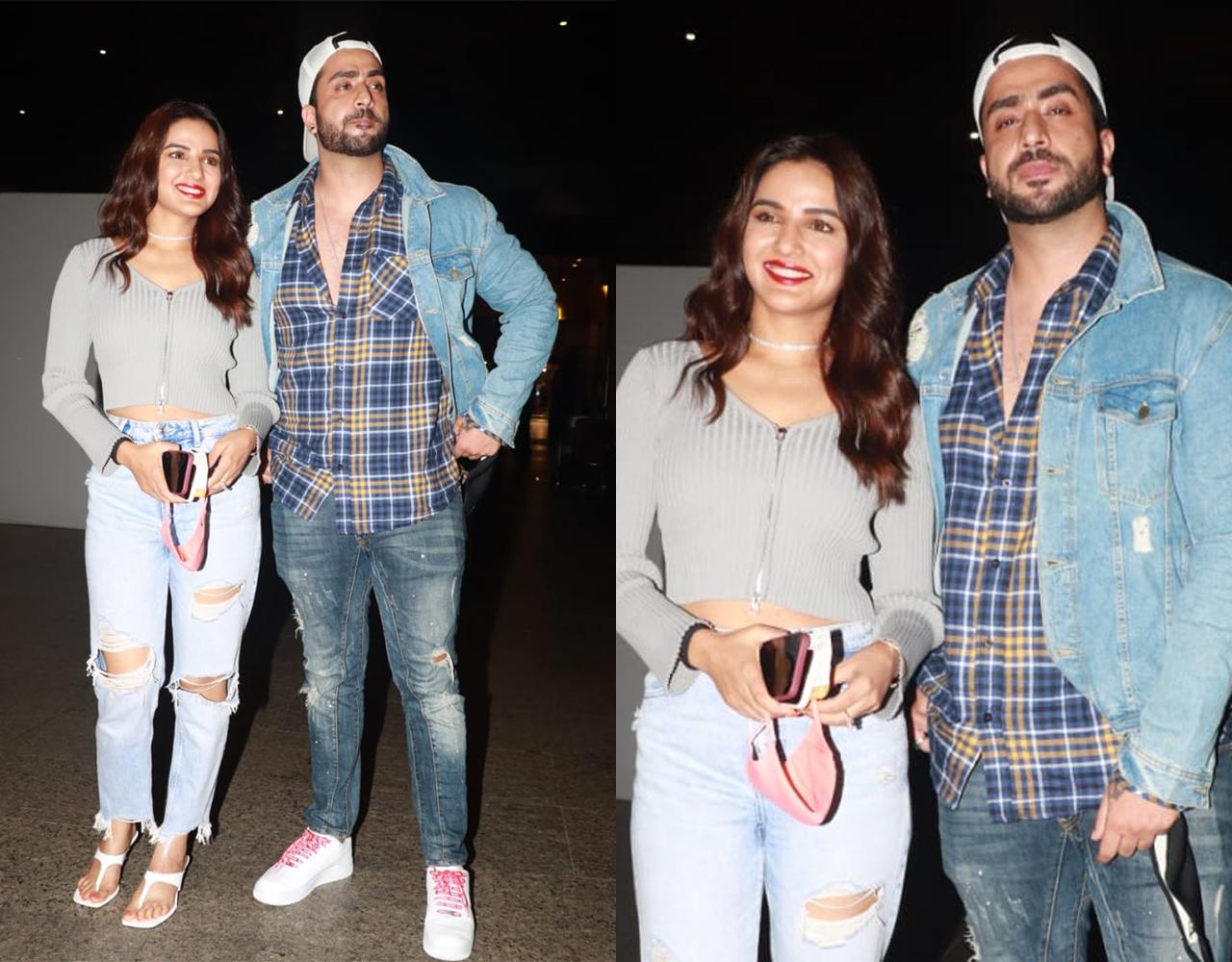 Jasmin Bhasin and Aly Goni too were clicked at Mumbai airport. The Television couple opted for a casual airport look. Jasmin was dressed in a grey crop top and ripped jeans, while Aly was seen in a denim-on-denim look with a checkered shirt underneath.