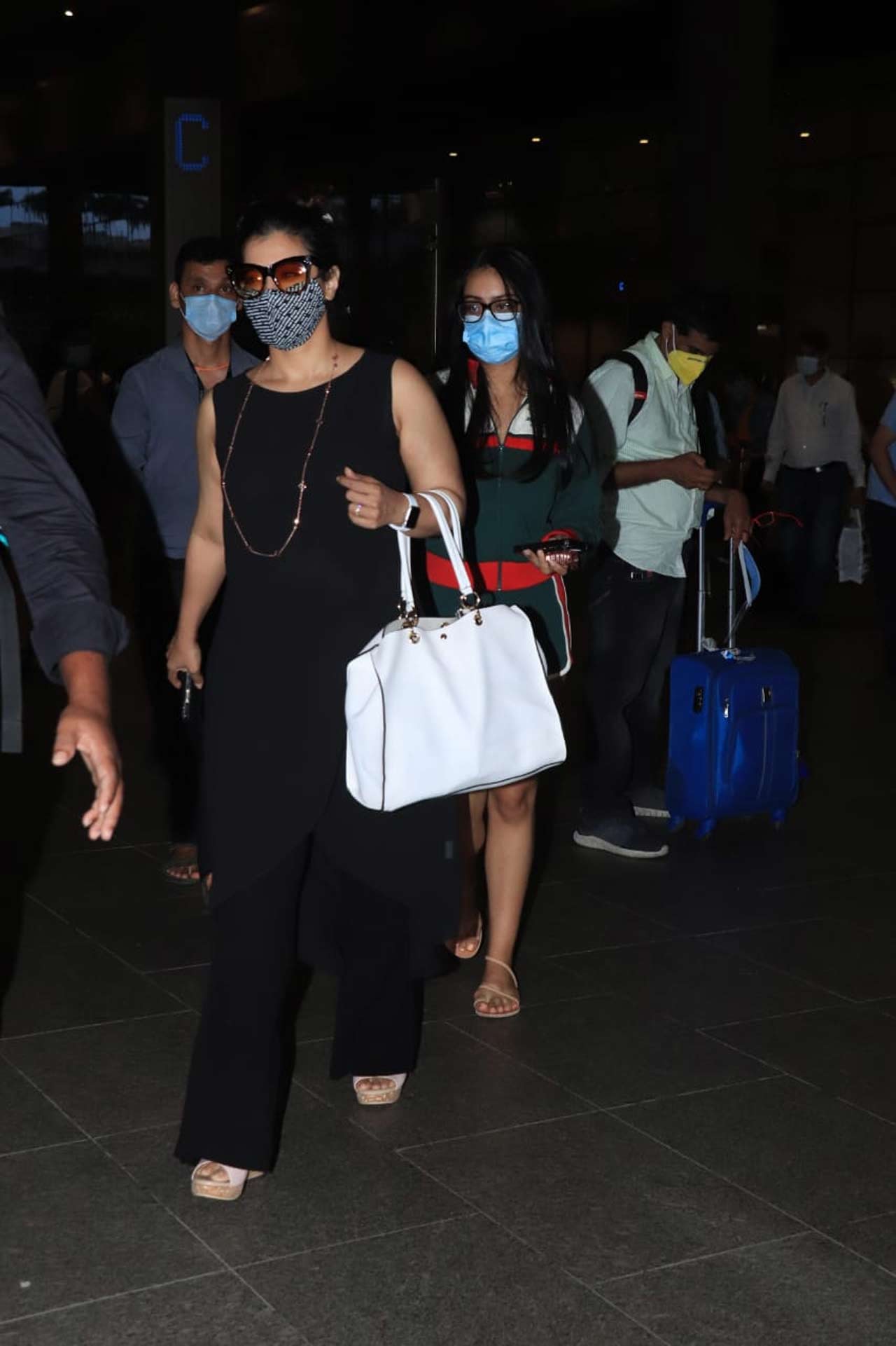 Kajol Devgan was snapped with daughter Nysa at the Mumbai airport. Kajol opted for an all-black outfit whereas Nysa dressed in a co-ord set as her airport look. The gen-z kid is truly a fashionista. 