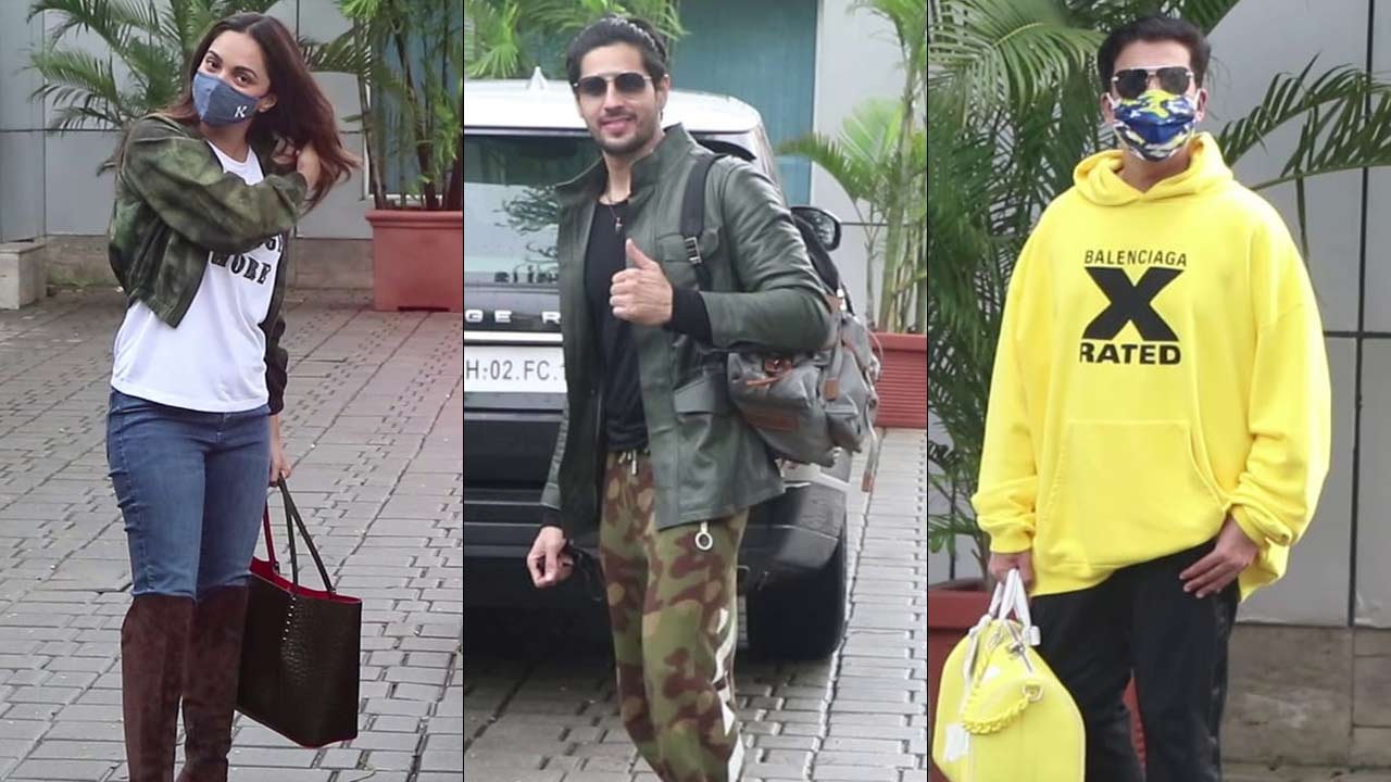 Kiara Advani, Sidharth Malhotra and Karan Johar were snapped together at Mumbai airport. Kiara opted for knee-length boots paired with a basic white tee and quirky jacket as her airport look. Sidharth Malhotra, who is all set to share the screen space for Shershaah, posed for the paparazzi when clicked at the airport.