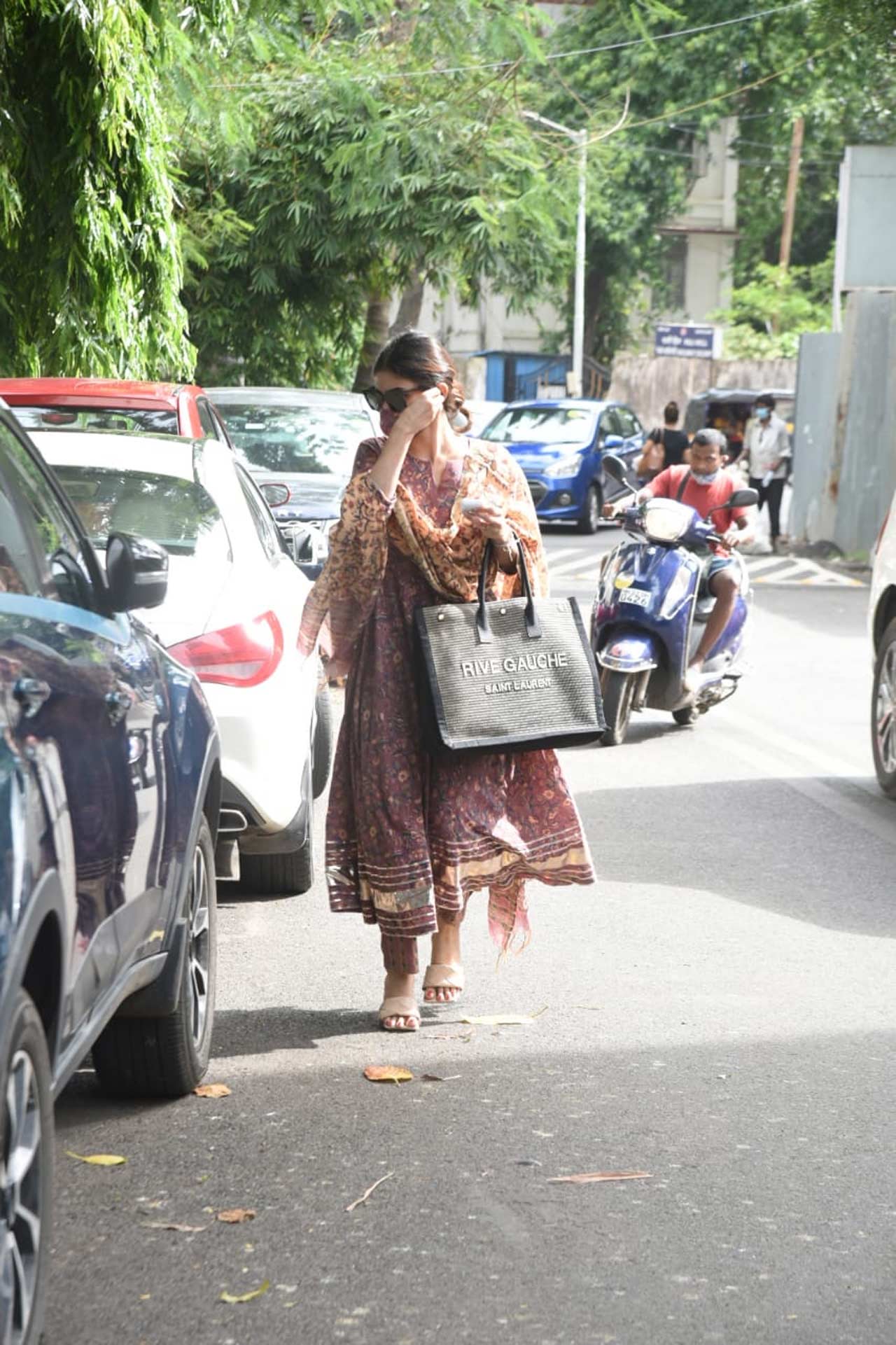 Mouni Roy was snapped meeting her friend Mandira Bedi at her Bandra residence. The actress and popular fitness diva lost her husband Raj Kaushal earlier this week.