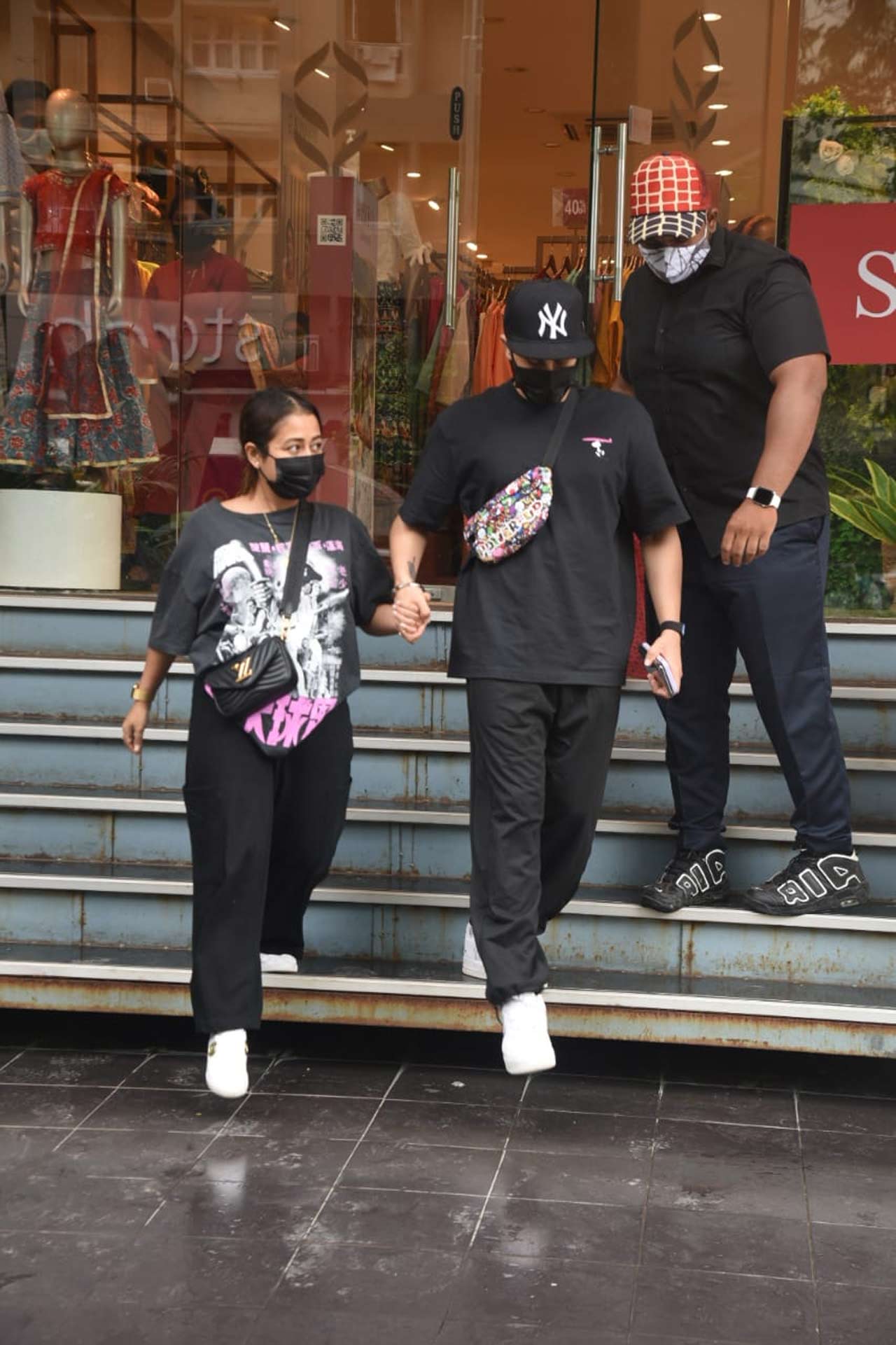 Neha Kakkar and Rohanpreet Singh was snapped at a shop in Bandra, Mumbai. The duo was seen wearing an all-black outfit during their casual outing in the city. 