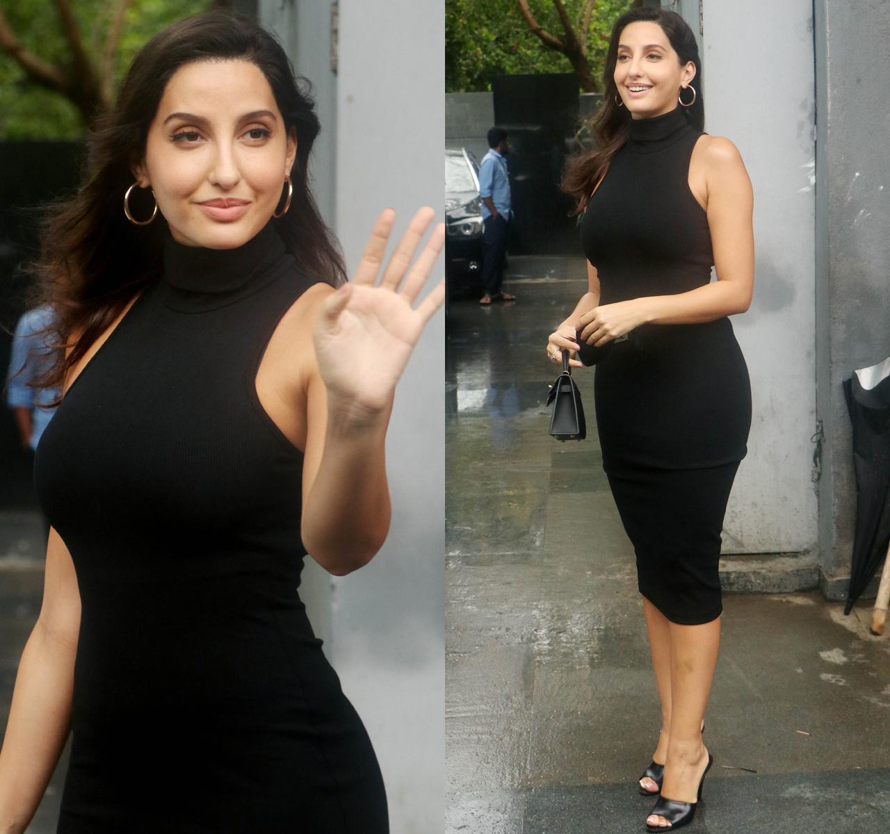 Nora Fatehi looked stunning as ever in a black bodycon dress, as she was snapped outside Pooja Entertainment office in Juhu, Mumbai. The actress is gearing up for the release of the film 'Bhuj: The Pride of India' in which she will be seen playing the role of a spy.