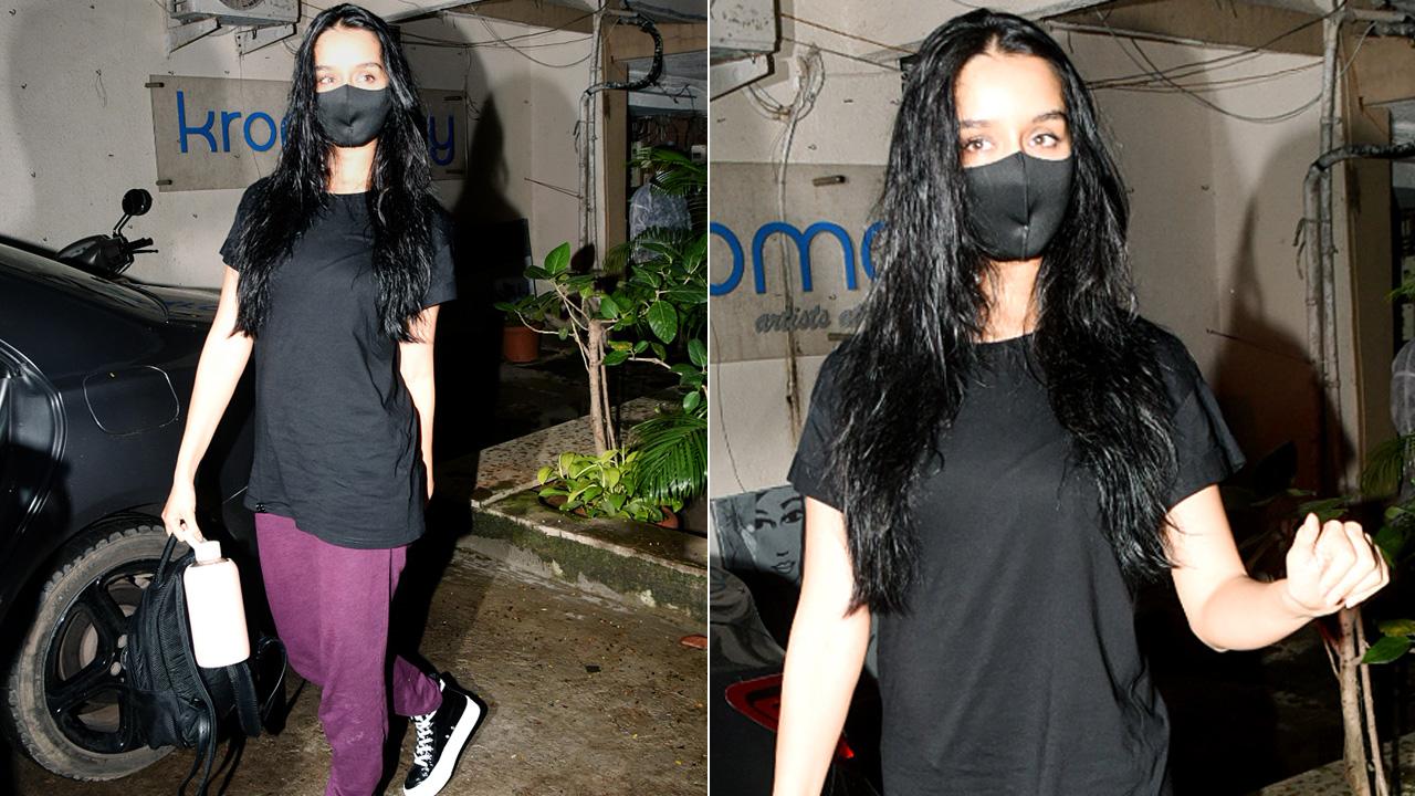 Shraddha Kapoor was clicked outside a popular salon in Juhu, Mumbai. The actress kept it simple by opting for a black t-shirt and purple track pants for her salon outing.