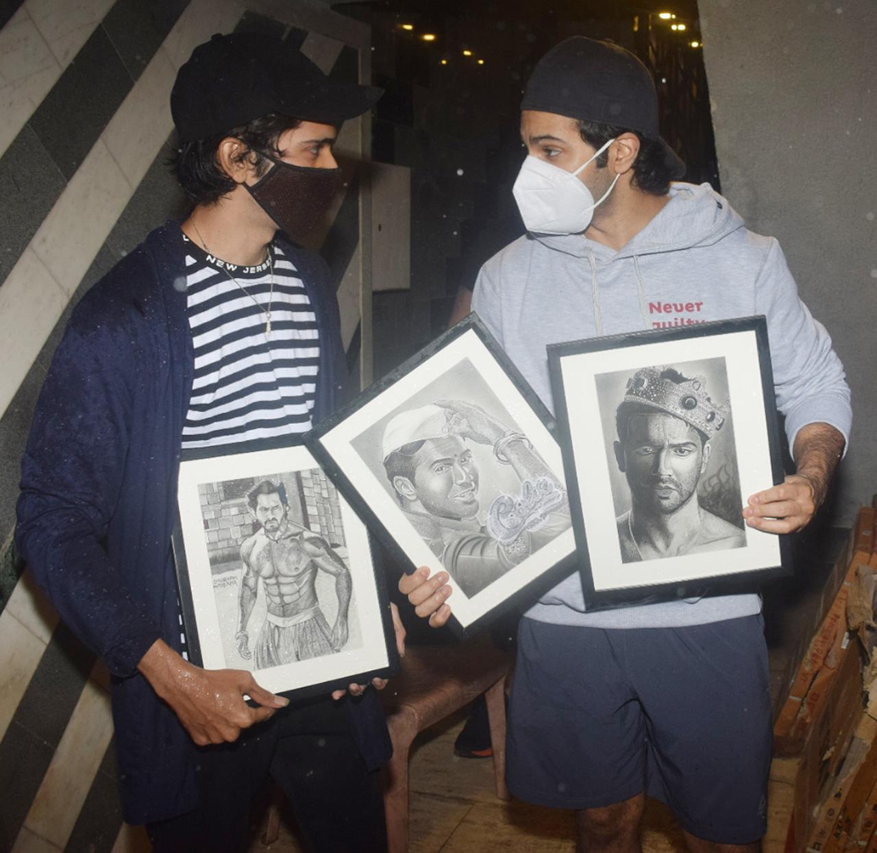 This self-explanatory picture said it all, don't you think so? The fan showered his love on Varun Dhawan by gifting him three beautiful photo frames, which had sketches of the actor's on-screen avatars.