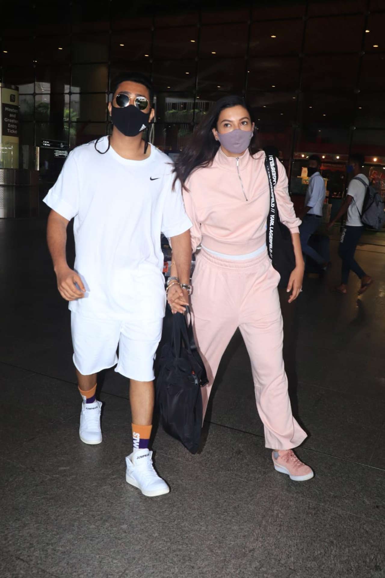 Zaid Darbar and Gauahar Khan, who has taken the internet by storm with their social media PDA and fun chemistry, were snapped by the shutterbugs at the Mumbai airport. The duo is popularly known for creating hilarious reels on Instagram. All pictures/Yogen Shah