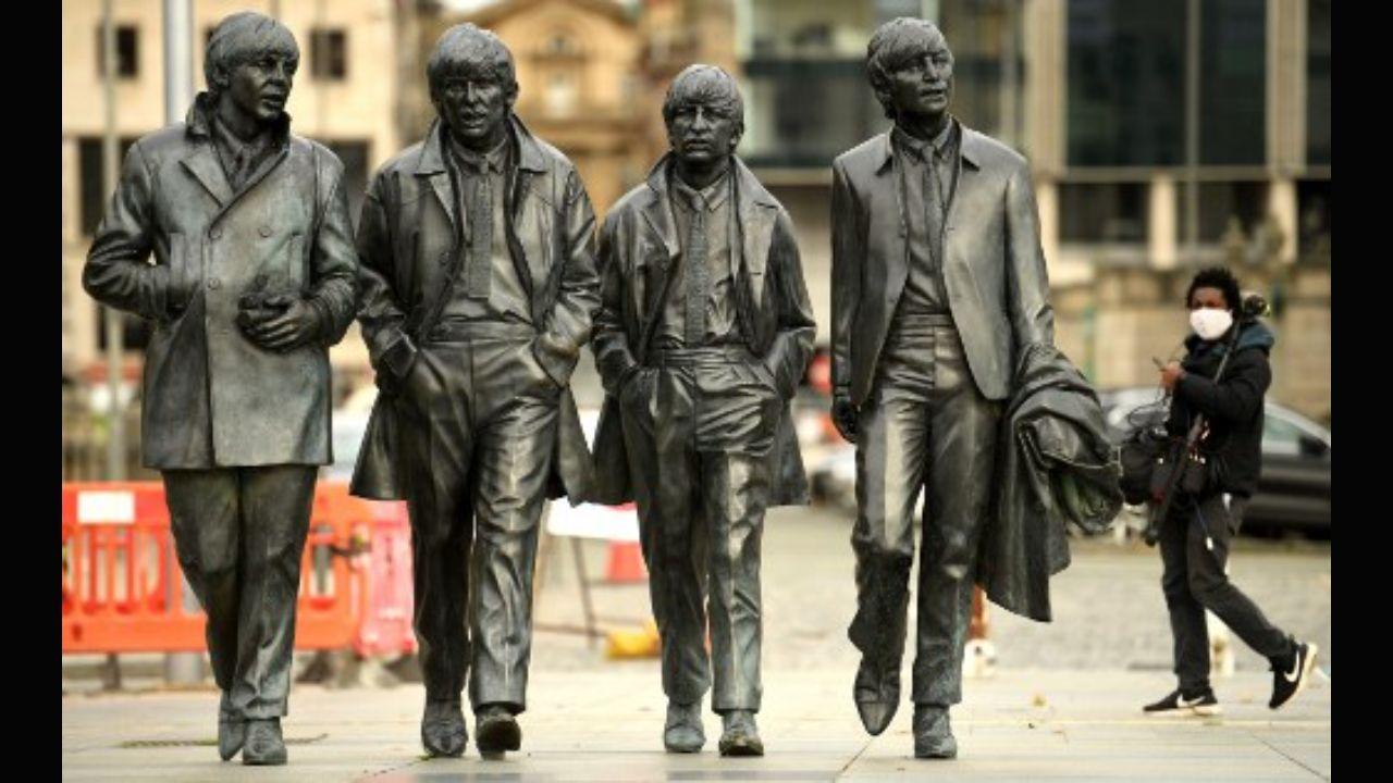A statue of The Beatles in Liverpool, northwest England on October 2, 2020. The Beatles formed their band in Liverpool in 1960. Photo: AFP