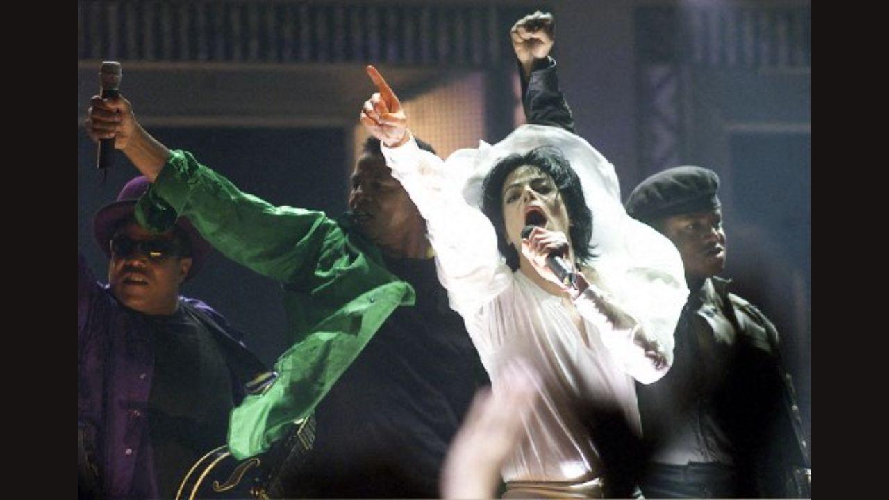 Michael Jackson (second from right) performs with his brothers at Madison Square Garden in New York in 2001. It was the first of two performances in New York as part of his ‘30th Anniversary Celebration, the Solo Years’. Photo: AFP
