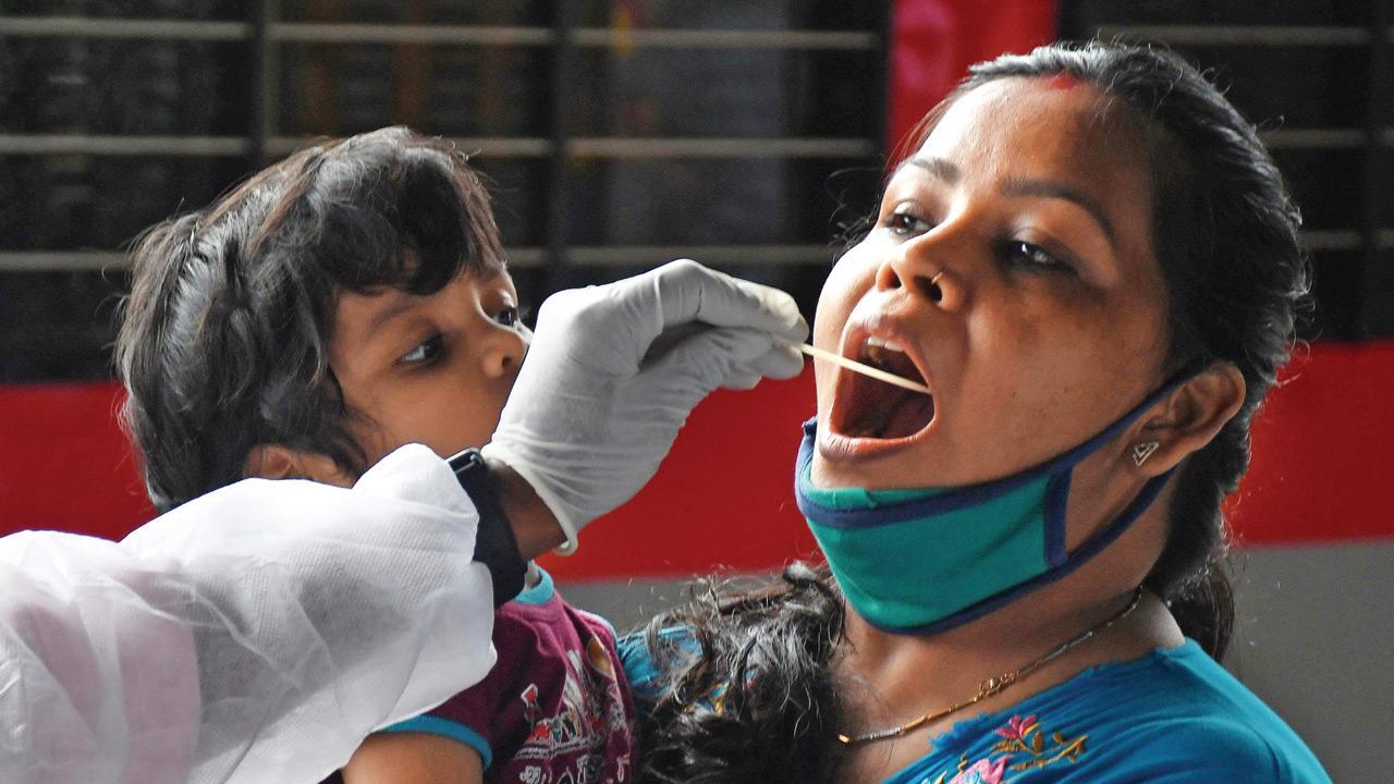 A passenger gets tested at Dadar on Friday. Pic/Ashish Raje