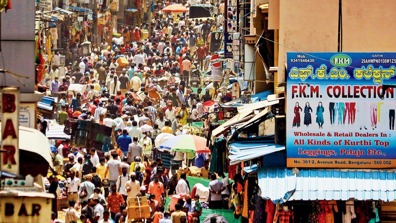 Fast reopening, slow vaccination risk renewed spike in infections: Oxford Economics