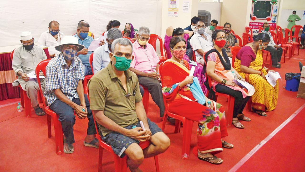 Hero to zero: Dharavi beat two Covid-19 waves, but response to vaccination has been lukewarm