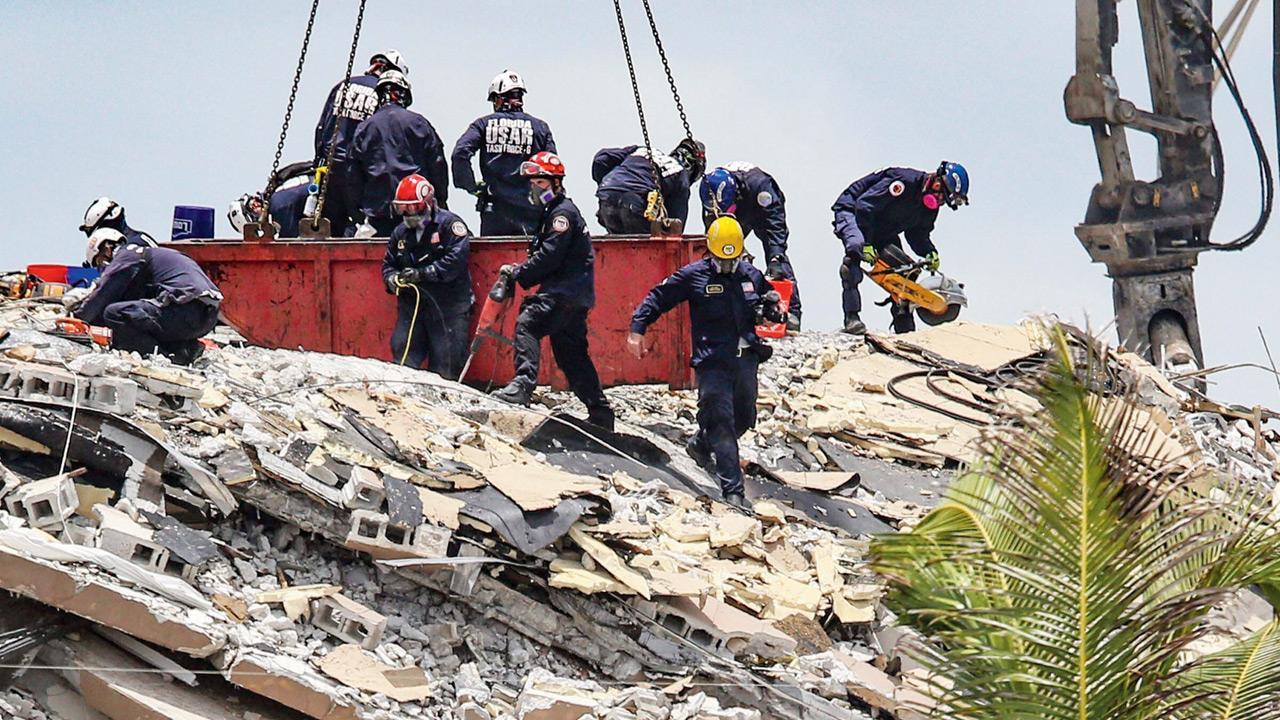 Miami building collapse death toll hits 5 as another body found; 156 missing