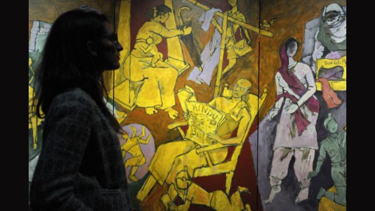 A painting, titled 'Indian Households', by MF Husain photographed on preview at the Victoria and Albert Museum for the 'M.F. Husain: Master of Modern Indian Painting' exhibition in central London in 2014.
Photo: AFP
